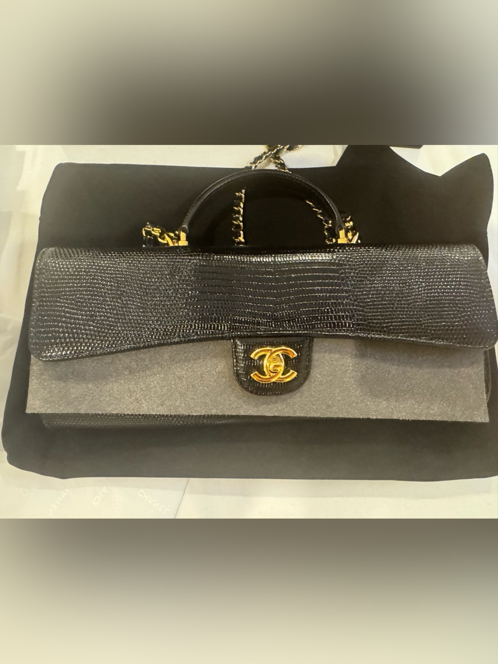 Chanel embossed lizard clutch on chain with handle